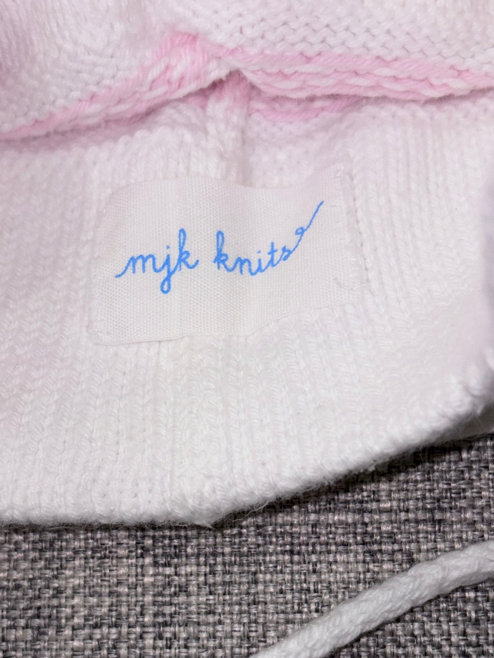 Kids Knit Earflap Hat with Pink Pom Pom and Bow Detail - Picture 2 of 3